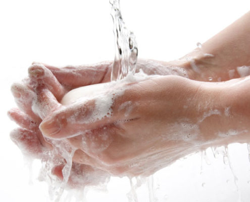 Washing hands with soap and water