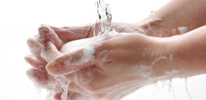 Washing hands with soap and water